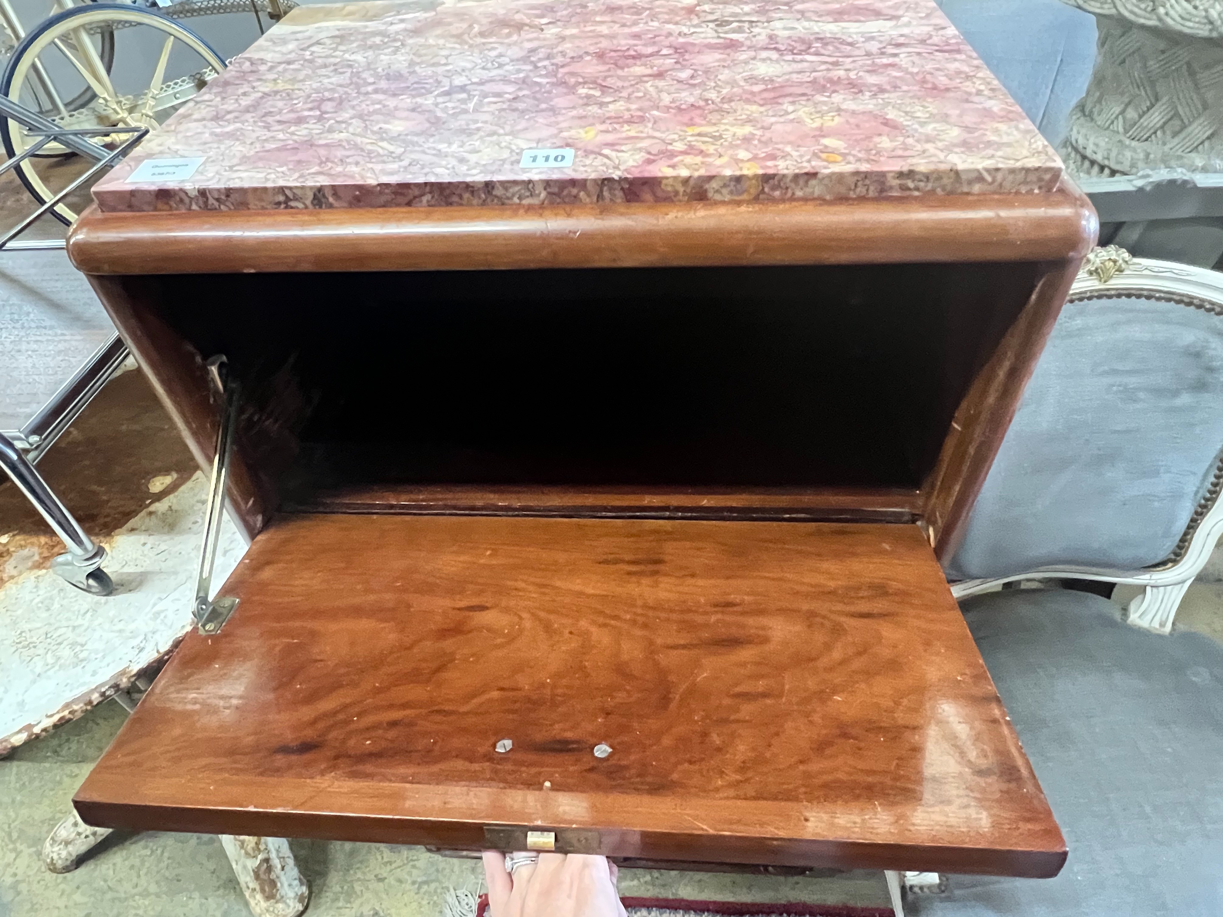 A French Art Deco style amboyna veneered marble topped drinks cabinet, width 61cm depth 40cm height 113cm